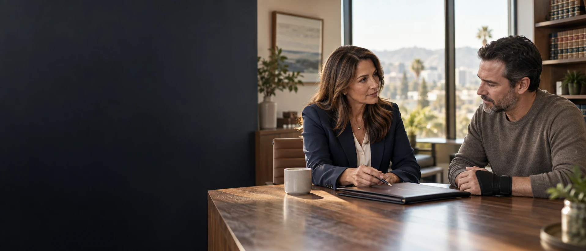 Illustrative personal injury lawyer meeting with a client